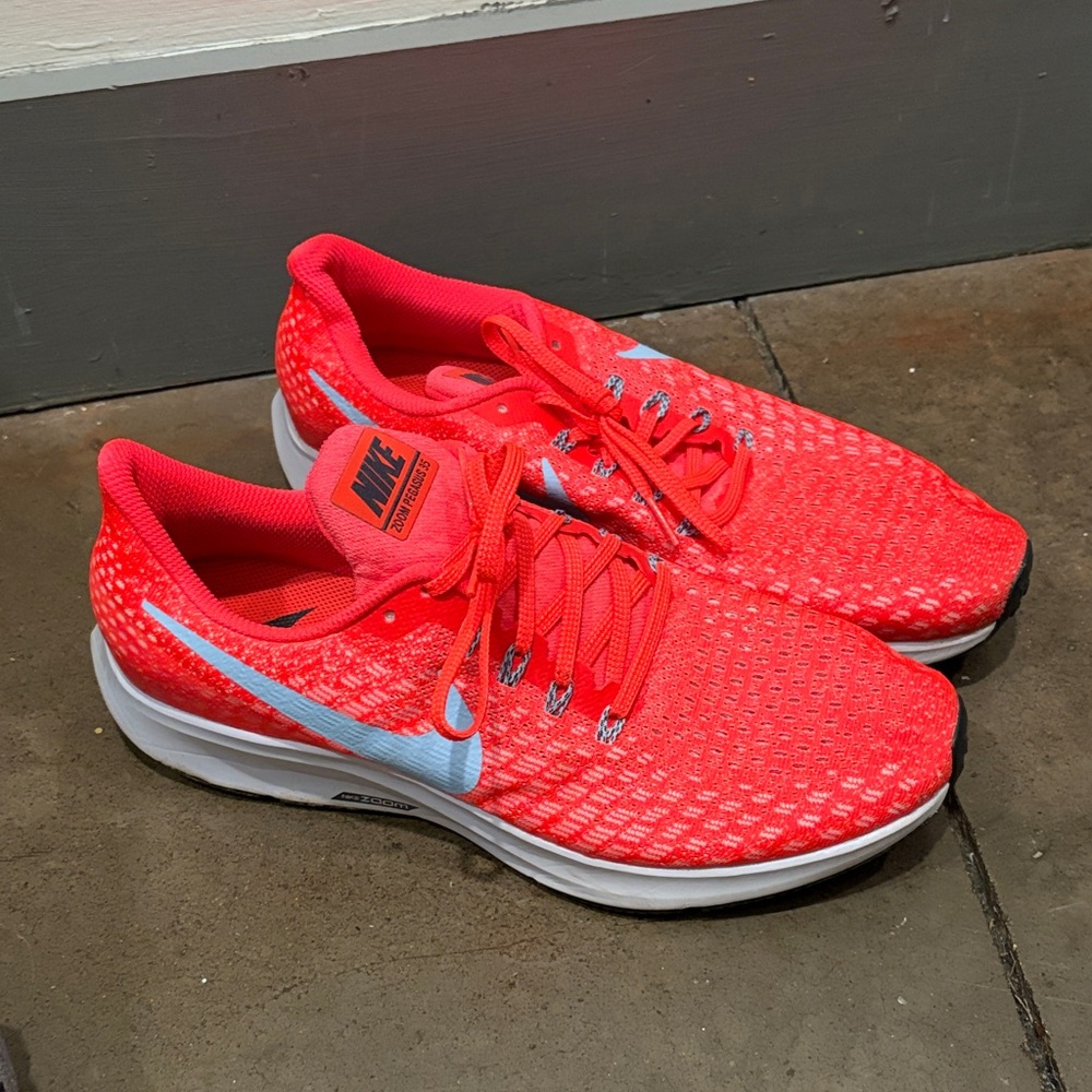 Nike Coral Pink Running Shoes with Light Blue Swoosh